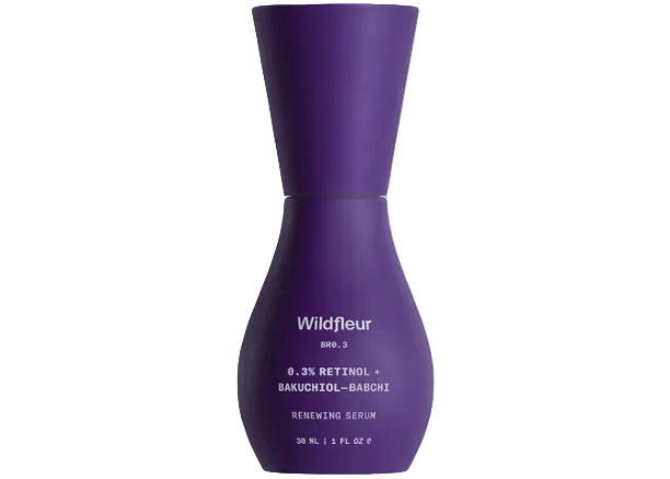Purple serum bottle with 'Wildfleur' branding on a white background