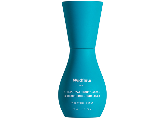 Blue serum bottle with 'Wildfleur' branding on a white background