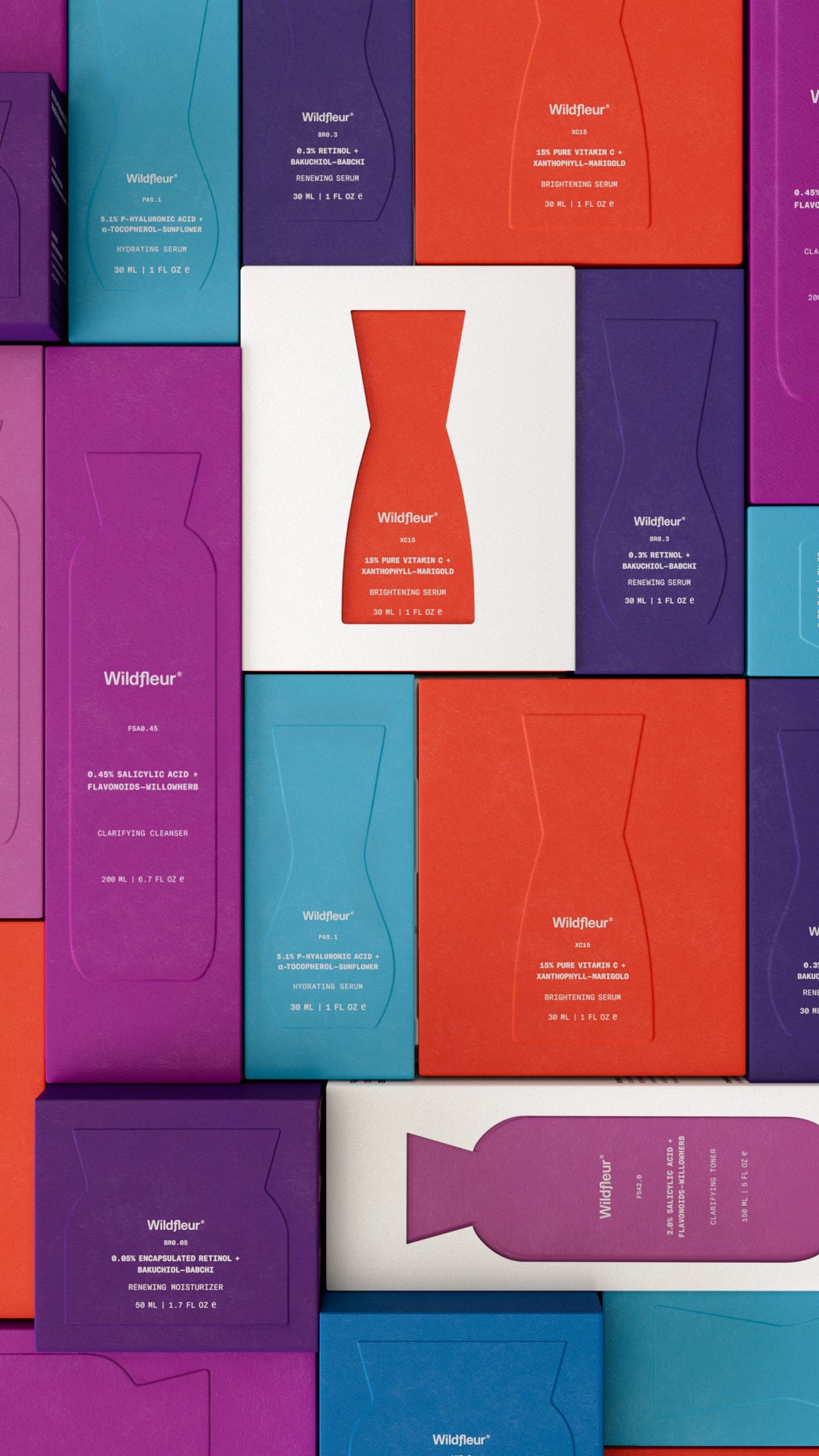 Colorful packaging boxes with 'Wildflower' branding on a white background