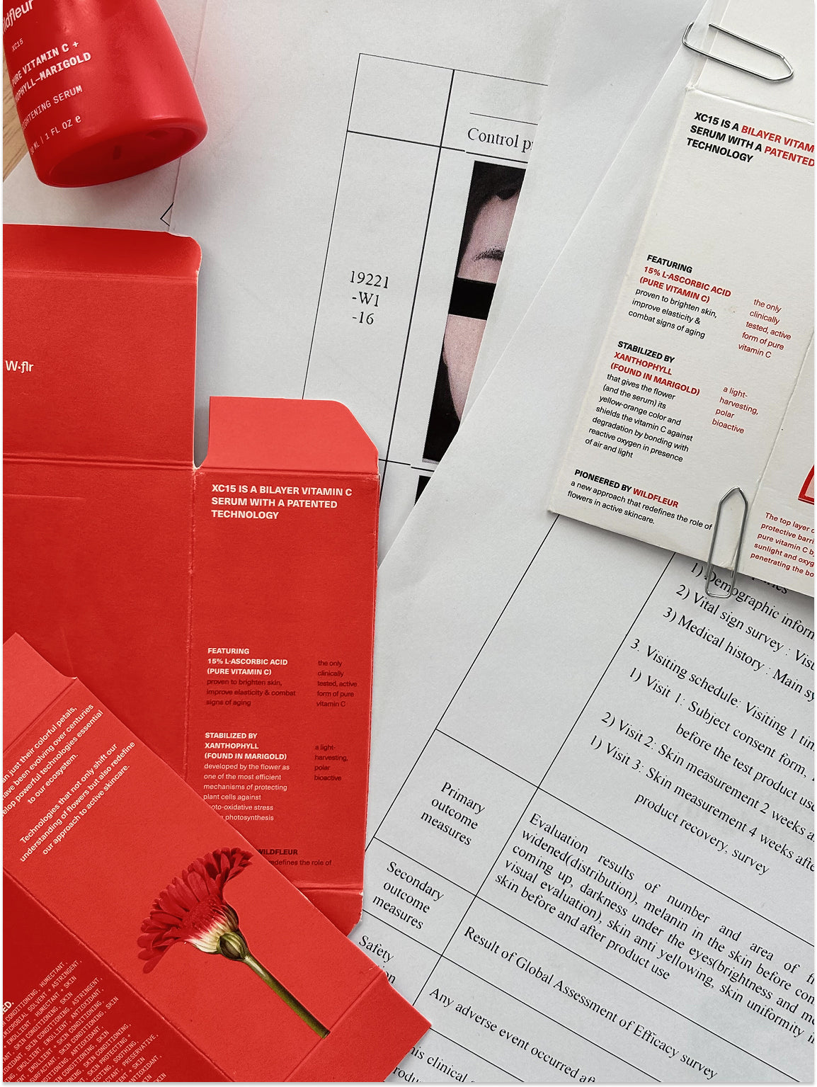 Red envelopes with floral design on a newspaper background