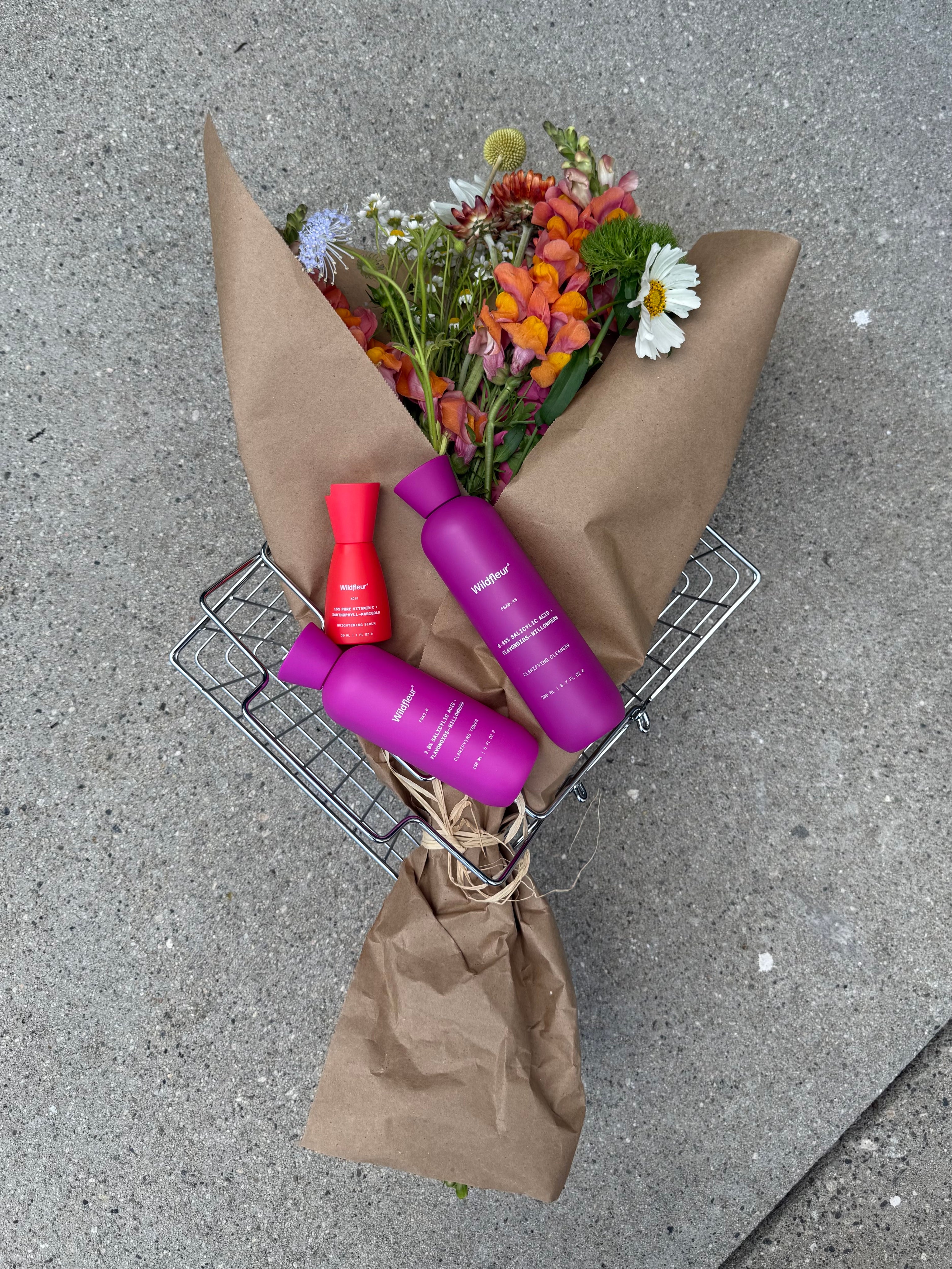 Image of xc15, toner, cleanser with flowers